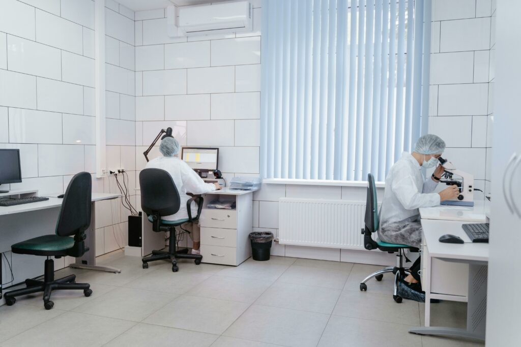 Lab technicians doing semen examination